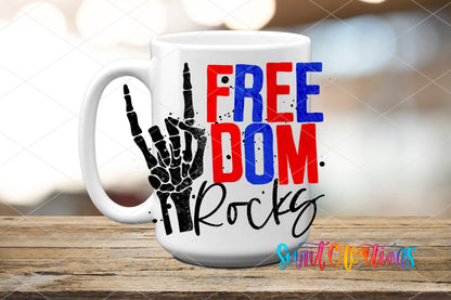 Freedom Rocks UV DTF transfer on a white ceramic coffee mug