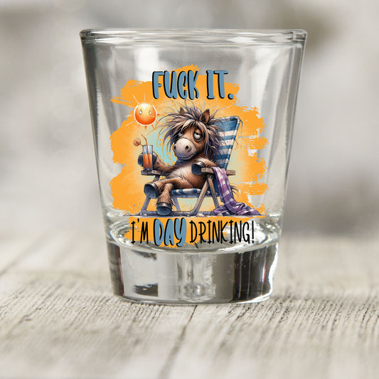 F*ck It I'm Day Drinking shot glass UV DTF transfer with donkey in a beach chair with a drink on a clear shot glass