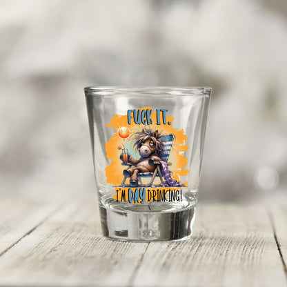 Close-up of the F*ck It I'm Day Drinking UV DTF transfer on a clear shot glass