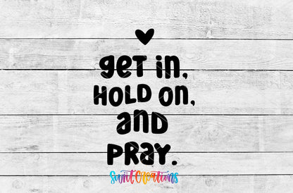 Get In Hold On and Pray UV DTF transfer artwork on a gray wood background
