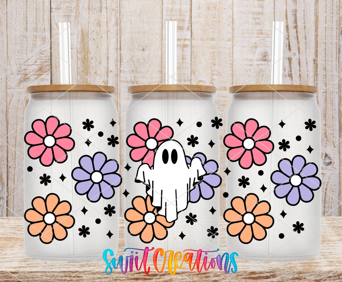 Retro Floral Ghost UV DTF full wrap on three clear glass cans with bamboo lids