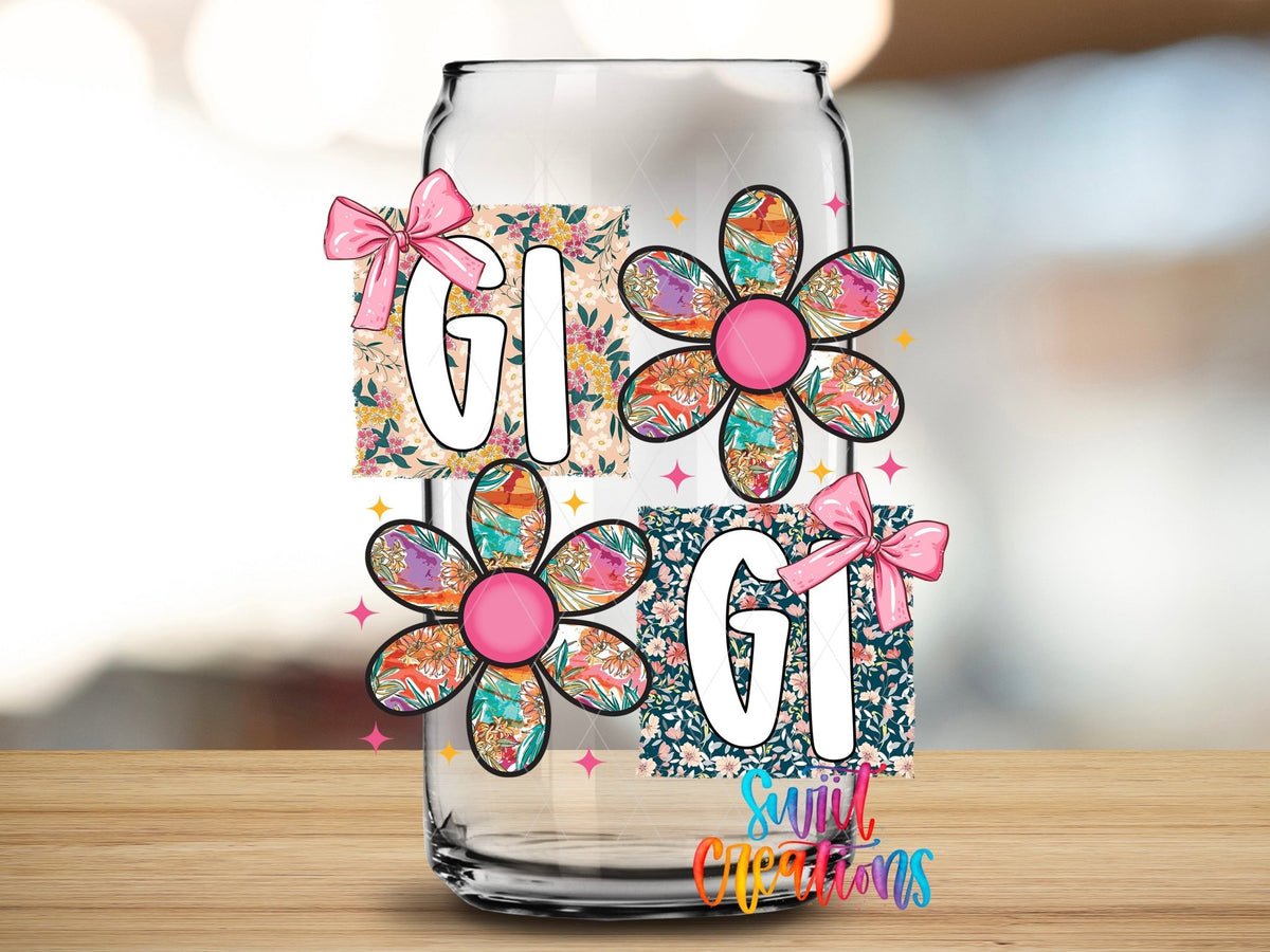 Close-up of the Gigi patchwork daisy UV DTF transfer on a clear glass can