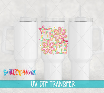 Gigi Tie Dye Flowers UV DTF transfer applied to a white tumbler set from Swiit Creations