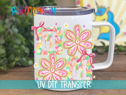 Gigi Tie Dye Flowers UV DTF transfer displayed on a white coffee mug from Swiit Creations