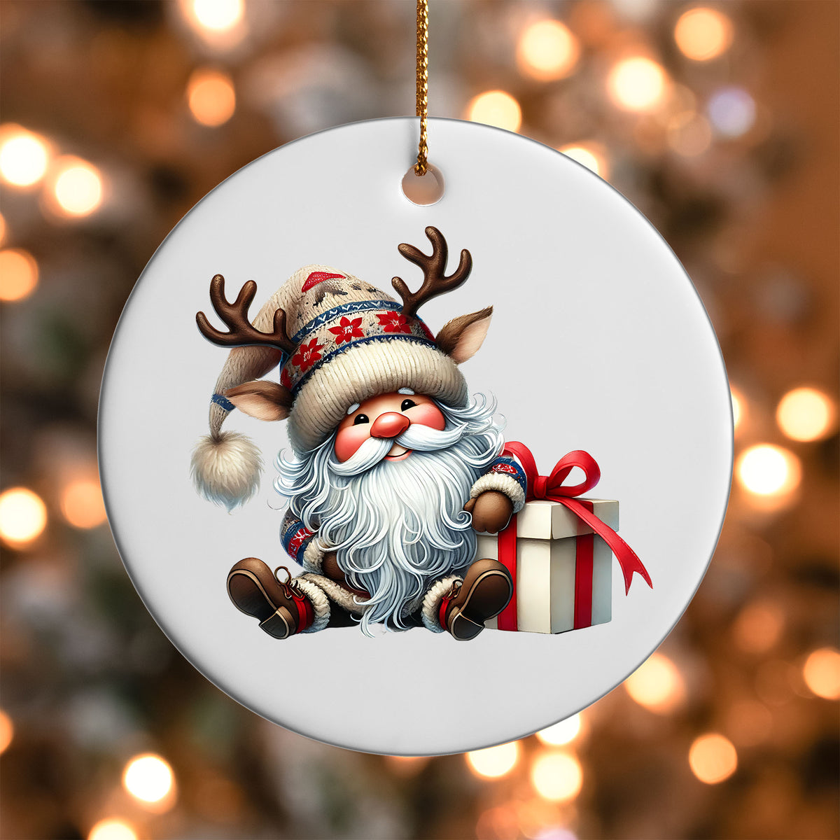 Gnome with a Gift Box ornament UV DTF transfer on a round white ornament with a bokeh light background