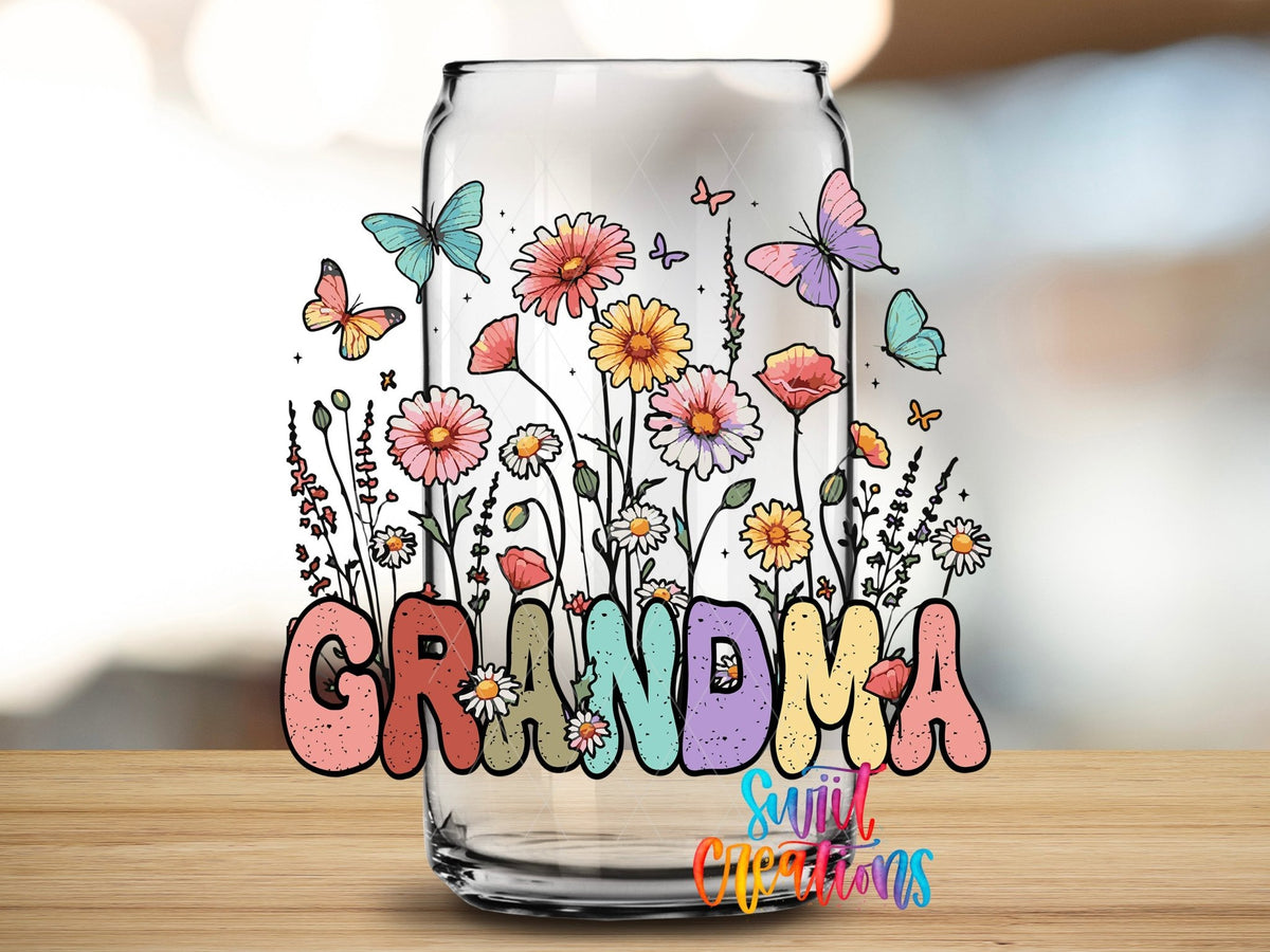 Close-up of the Grandma wildflowers and butterflies UV DTF transfer on a clear glass can