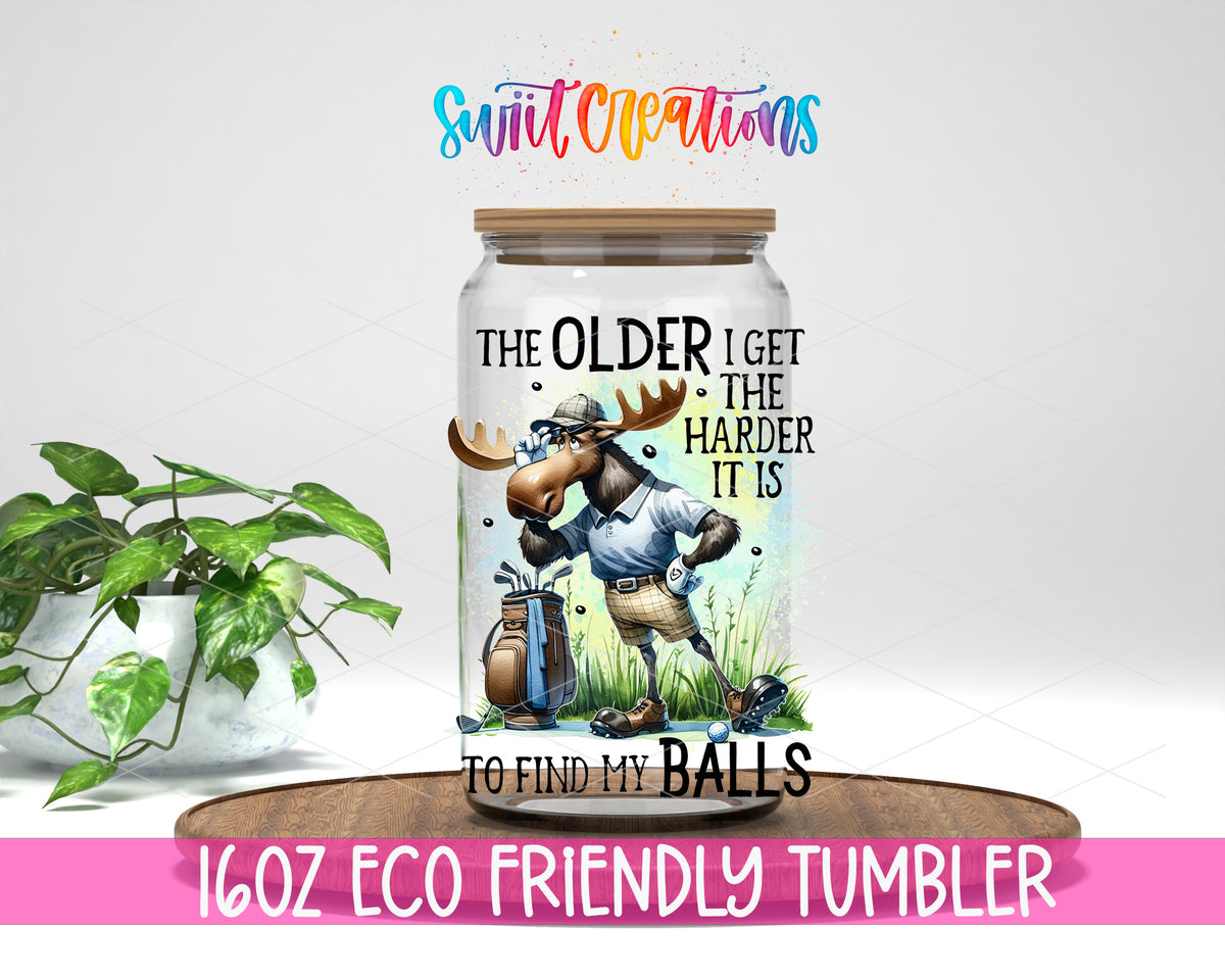 The Older I Get Golf Moose design on a 16 oz clear glass tumbler with bamboo lid