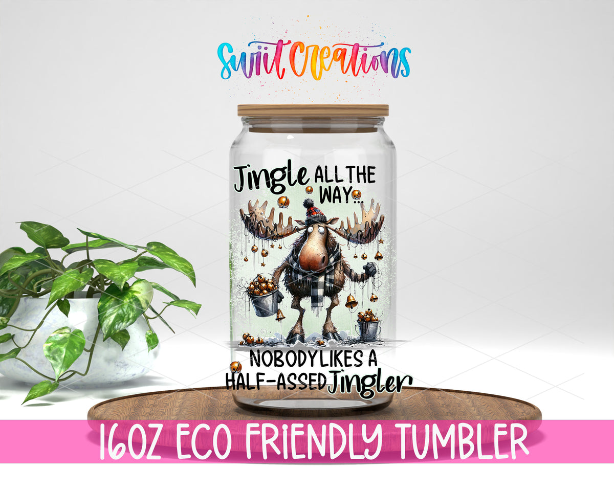 Jingle All the Way Moose design on a 16 oz clear glass tumbler with bamboo lid
