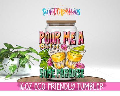 Pour Me a Shot of Paradise design on a 16 oz clear glass tumbler with bamboo lid