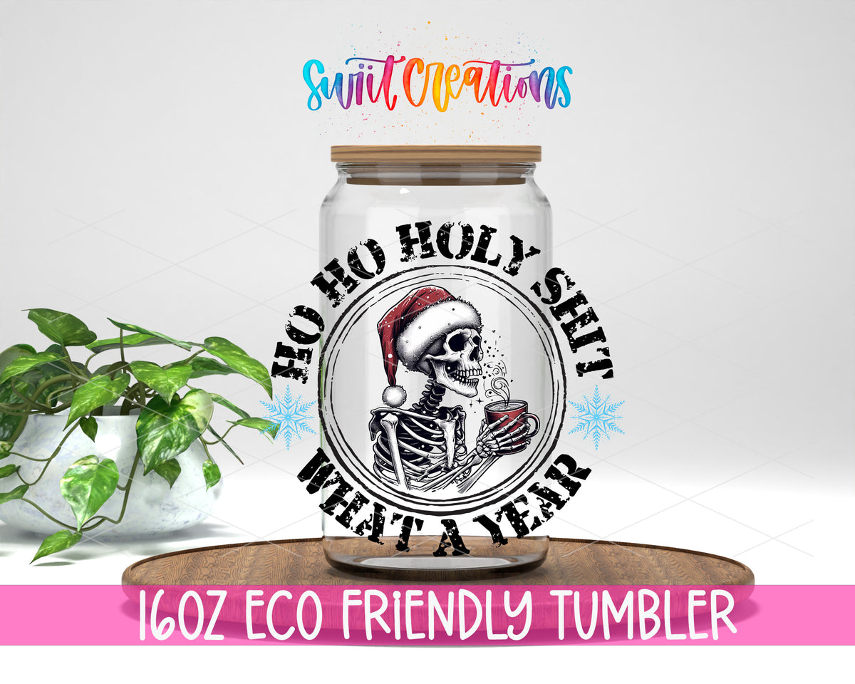 Ho Ho Holy Shit What a Year design on a 16 oz clear glass tumbler with bamboo lid