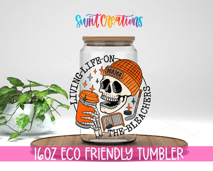 Hockey Mama Living Life on the Bleachers design on a 16 oz clear glass tumbler with bamboo lid
