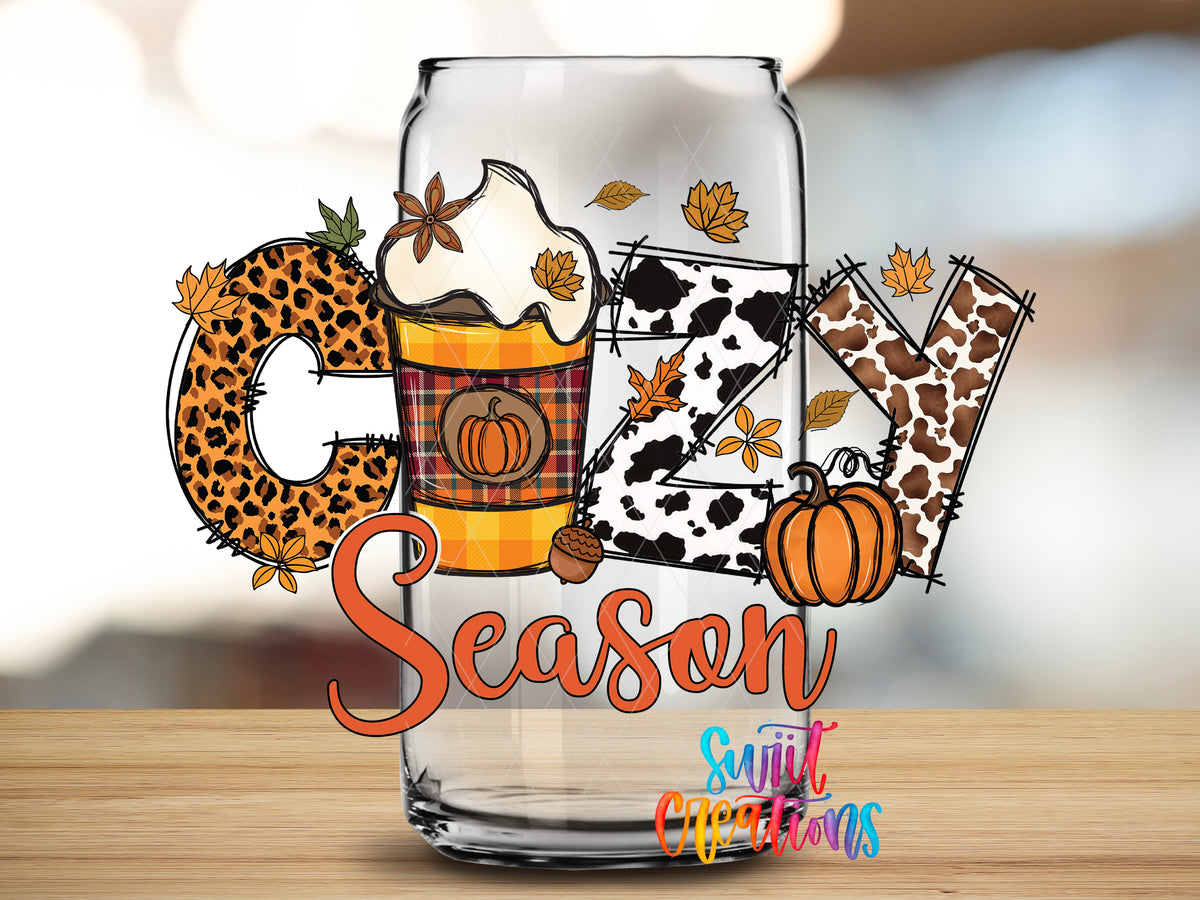 Cozy Season design close-up on a clear glass can tumbler
