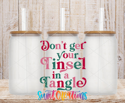 Do Not Get Your Tinsel in a Tangle frosted glass tumbler mockup with bamboo lids and straws