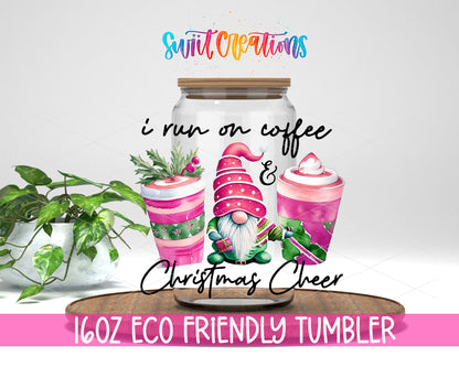 Coffee and Christmas Cheer Gnome design on a 16 oz clear glass tumbler with bamboo lid