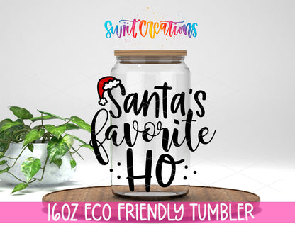 Santa Favorite Ho design on a 16 oz clear glass tumbler with bamboo lid