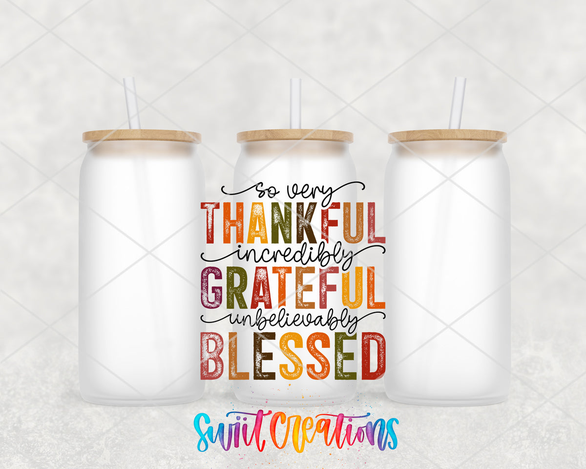Thankful Grateful Blessed frosted glass tumbler group view with lids and straws