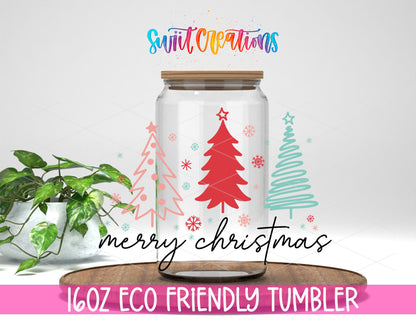 Merry Christmas Three Trees design on a 16 oz clear glass tumbler with bamboo lid
