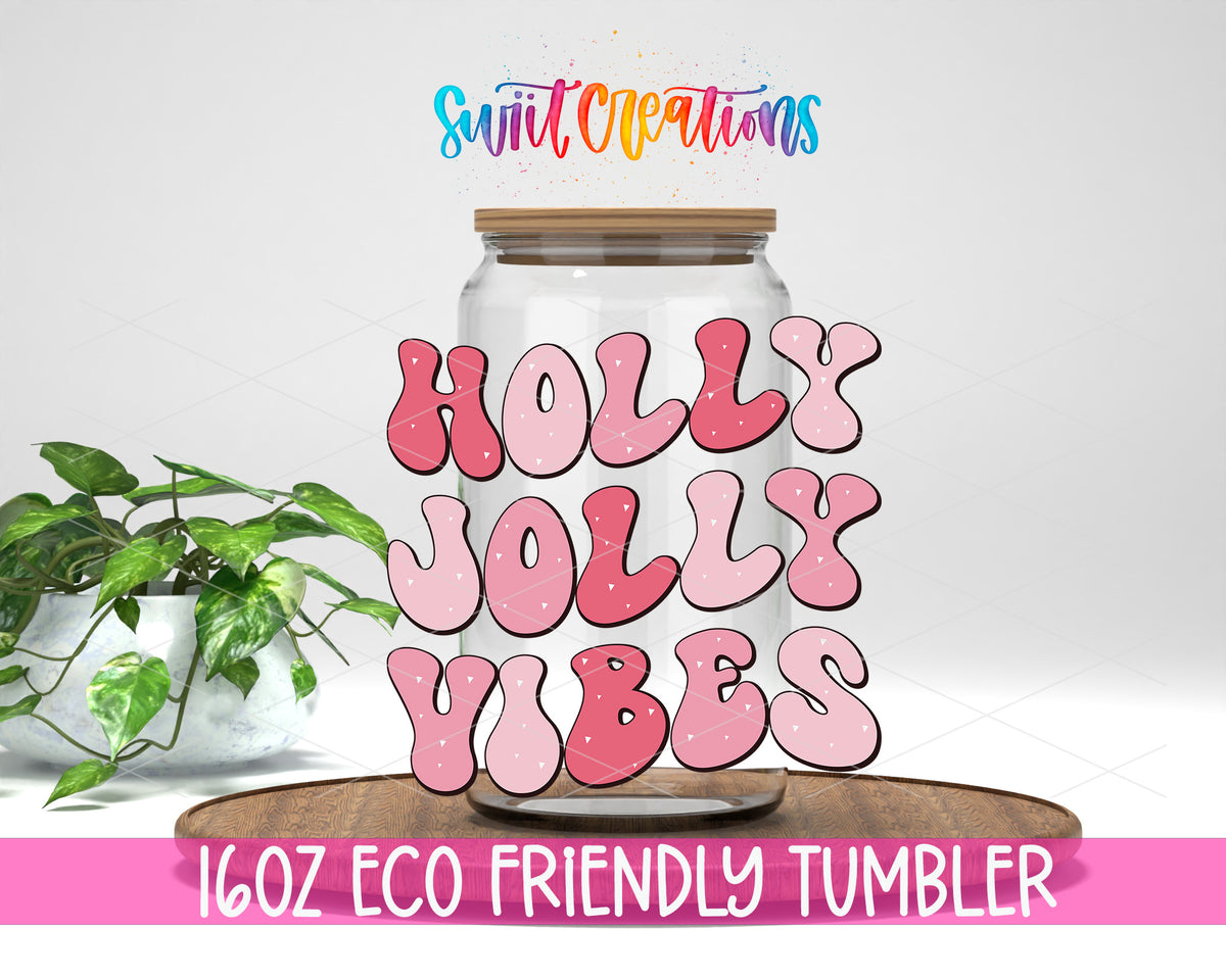 Holly Jolly Vibes design on a 16 oz clear glass tumbler with bamboo lid
