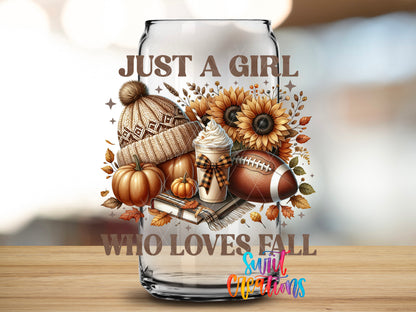 Just a Girl Who Loves Fall design close-up on a clear glass can tumbler