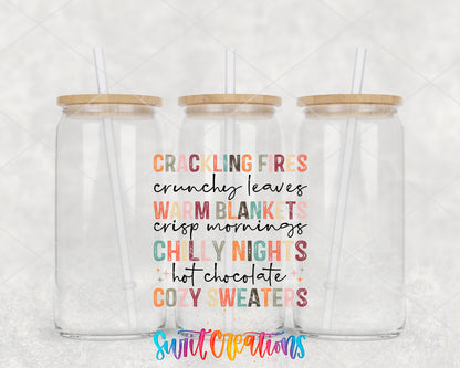 Crackling Fires Cozy Sweaters clear glass tumbler group mockup with bamboo lids and straws