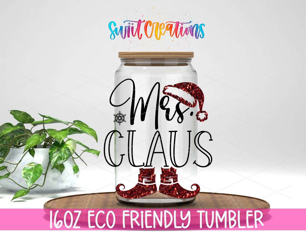 Mrs. Claus Christmas design on a 16 oz clear glass tumbler with bamboo lid