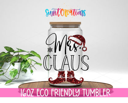 Mrs. Claus Christmas design on a 16 oz clear glass tumbler with bamboo lid