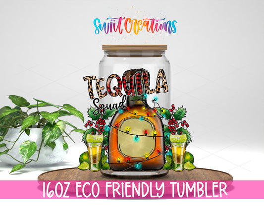Christmas Tequila Squad design on a 16 oz clear glass tumbler with bamboo lid