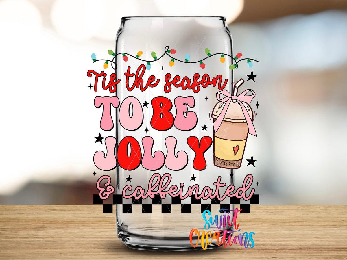 Tis the Season to Be Jolly and Caffeinated design close-up on a clear glass can tumbler