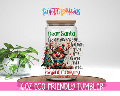 Dear Santa I'll Buy My Own Stuff design on a 16 oz clear glass tumbler with bamboo lid