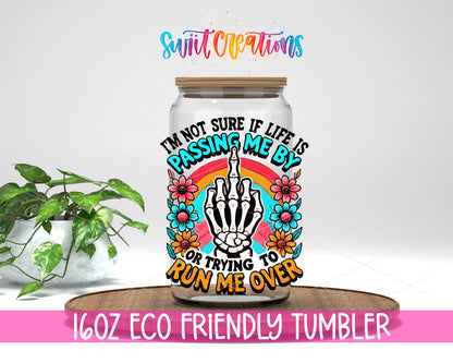 Life Is Passing Me By design on a 16 oz clear glass tumbler with bamboo lid
