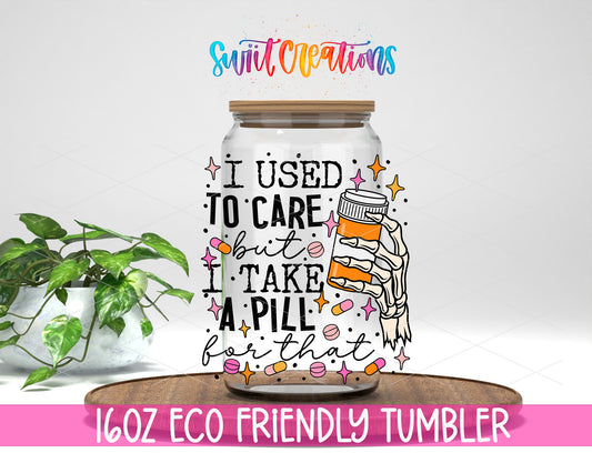 I Used to Care design on a 16 oz clear glass tumbler with bamboo lid