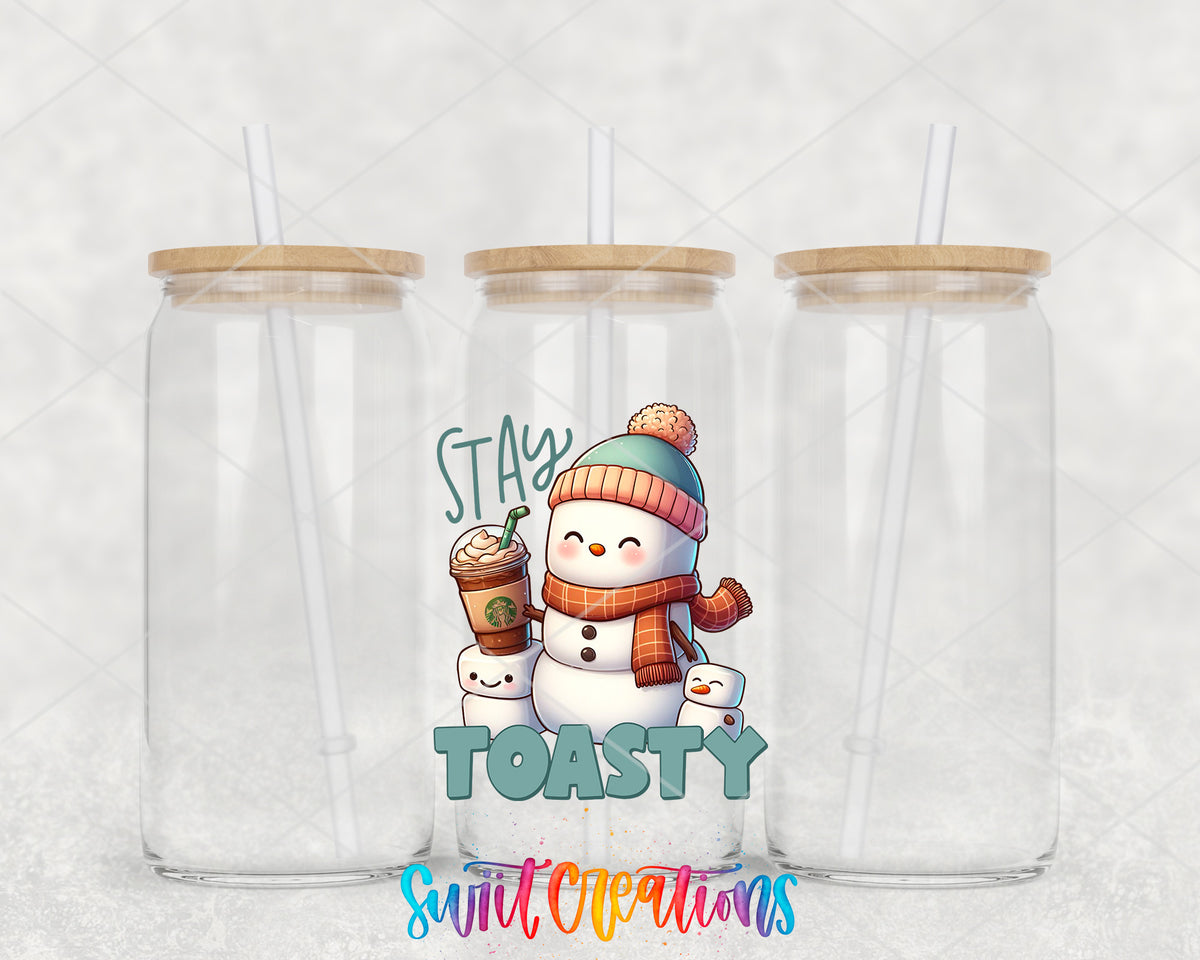 Stay Toasty Snowman clear glass tumbler group mockup with bamboo lids and straws