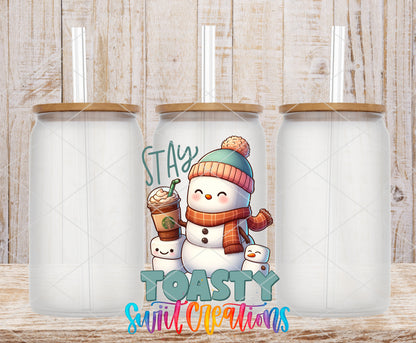 Stay Toasty Snowman frosted glass tumbler mockup with bamboo lids and straws