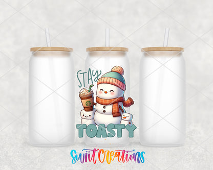 Stay Toasty Snowman frosted glass tumbler group view with lids and straws