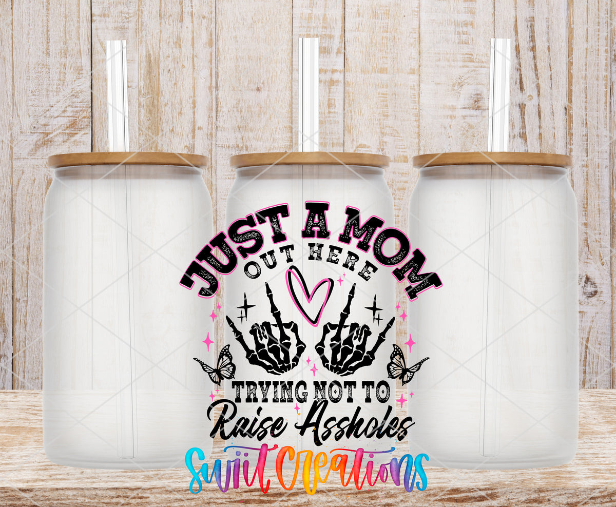 Trying Not to Raise Assholes frosted glass tumbler mockup with bamboo lids and straws
