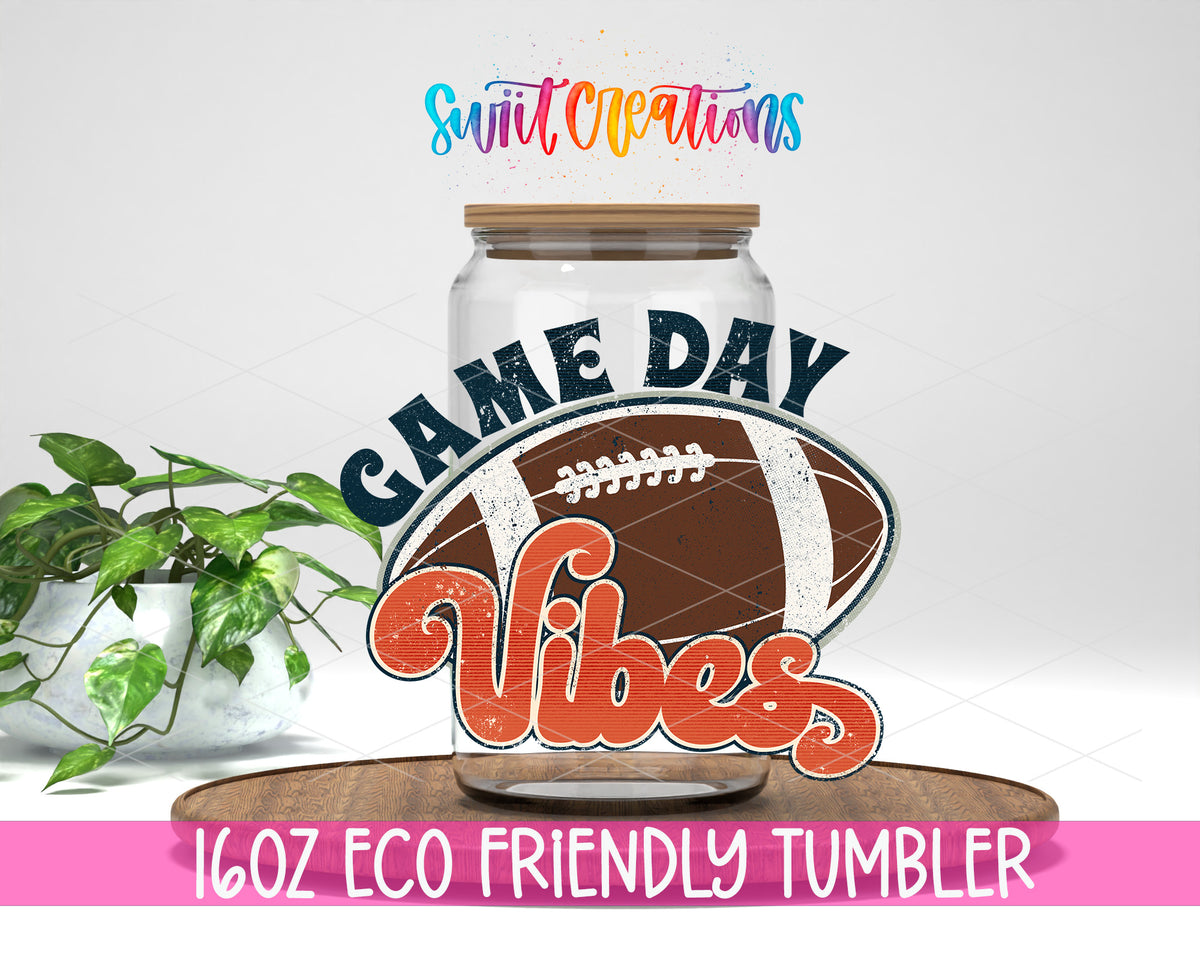 Football Game Day Vibes design on a 16 oz clear glass tumbler with bamboo lid