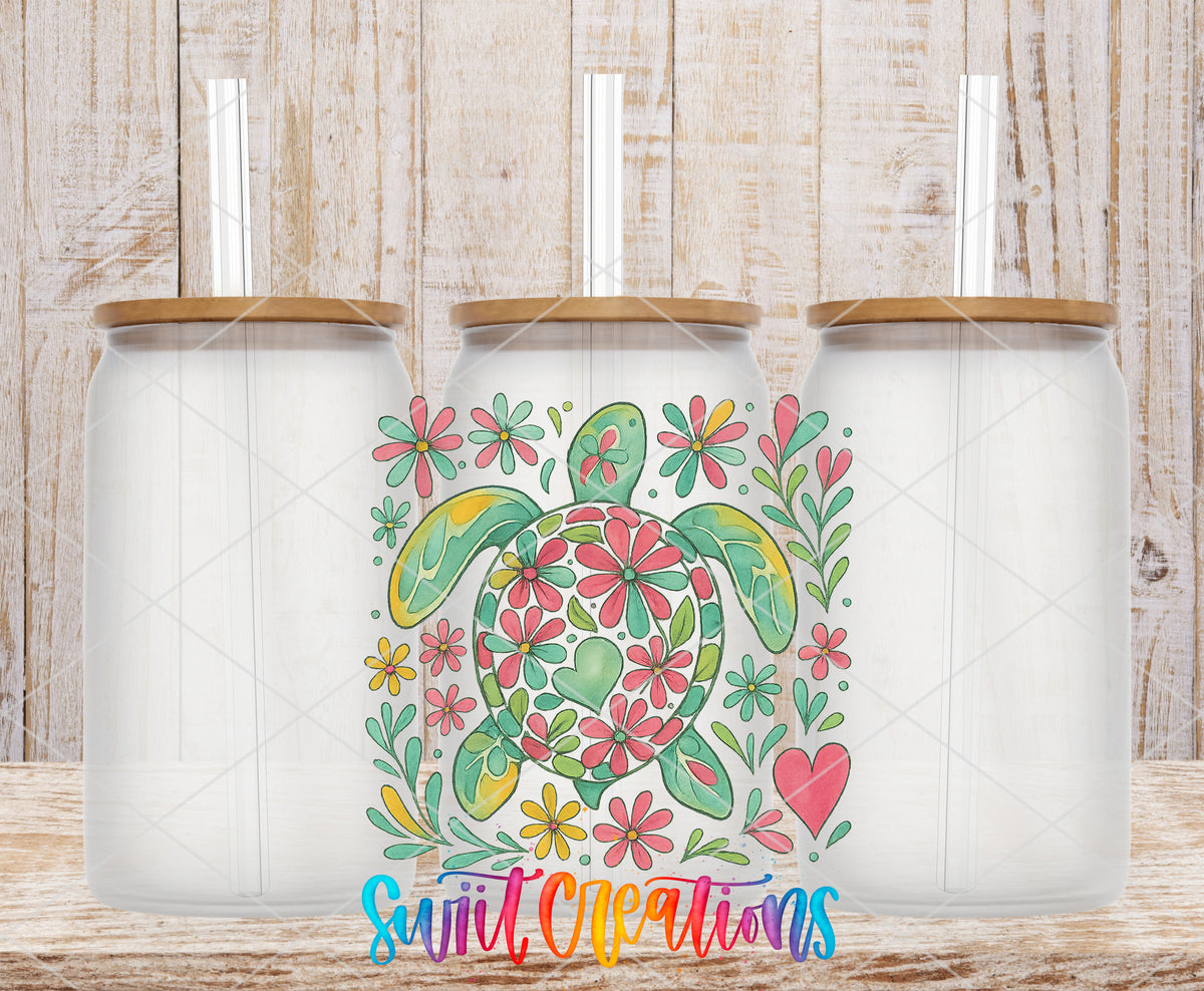 Floral Sea Turtle frosted glass tumbler mockup with bamboo lids and straws