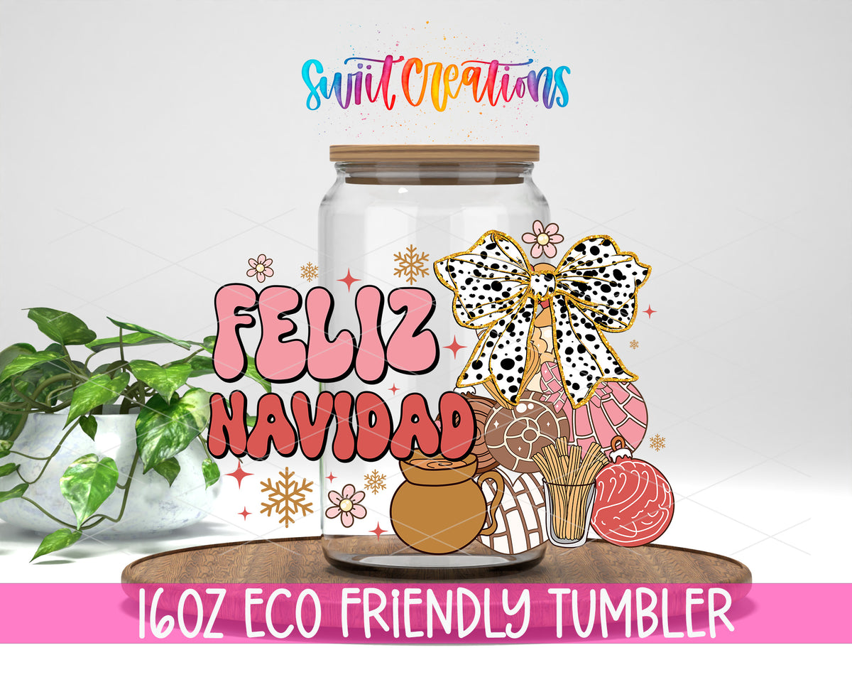 Feliz Navidad Coquette design on a 16 oz clear glass tumbler with bamboo lid