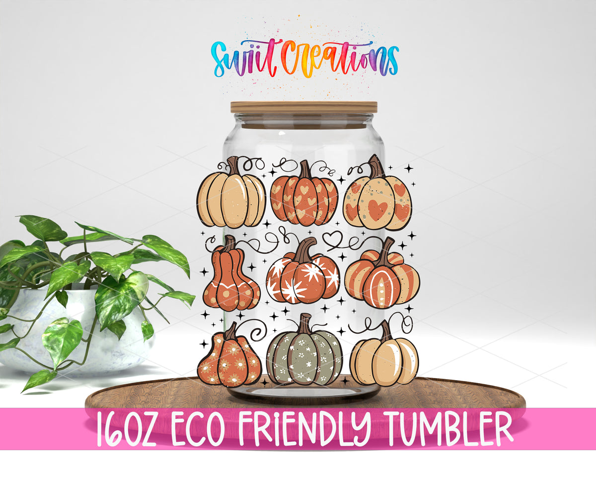 Retro Pumpkin design on a 16 oz clear glass tumbler with bamboo lid