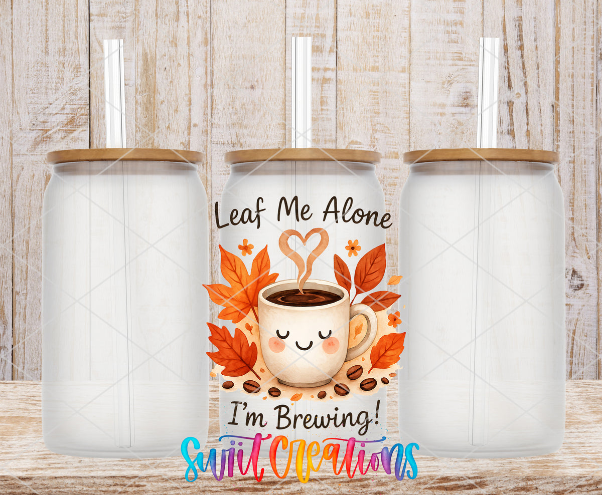 Leaf Me Alone frosted glass tumbler mockup with bamboo lids and straws