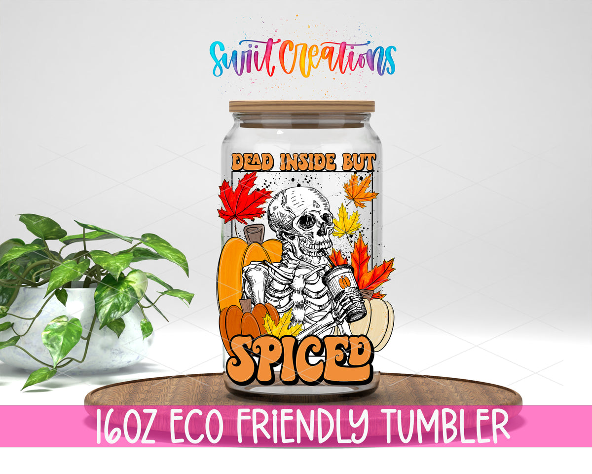 Dead Inside but Spiced design on a 16 oz clear glass tumbler with bamboo lid