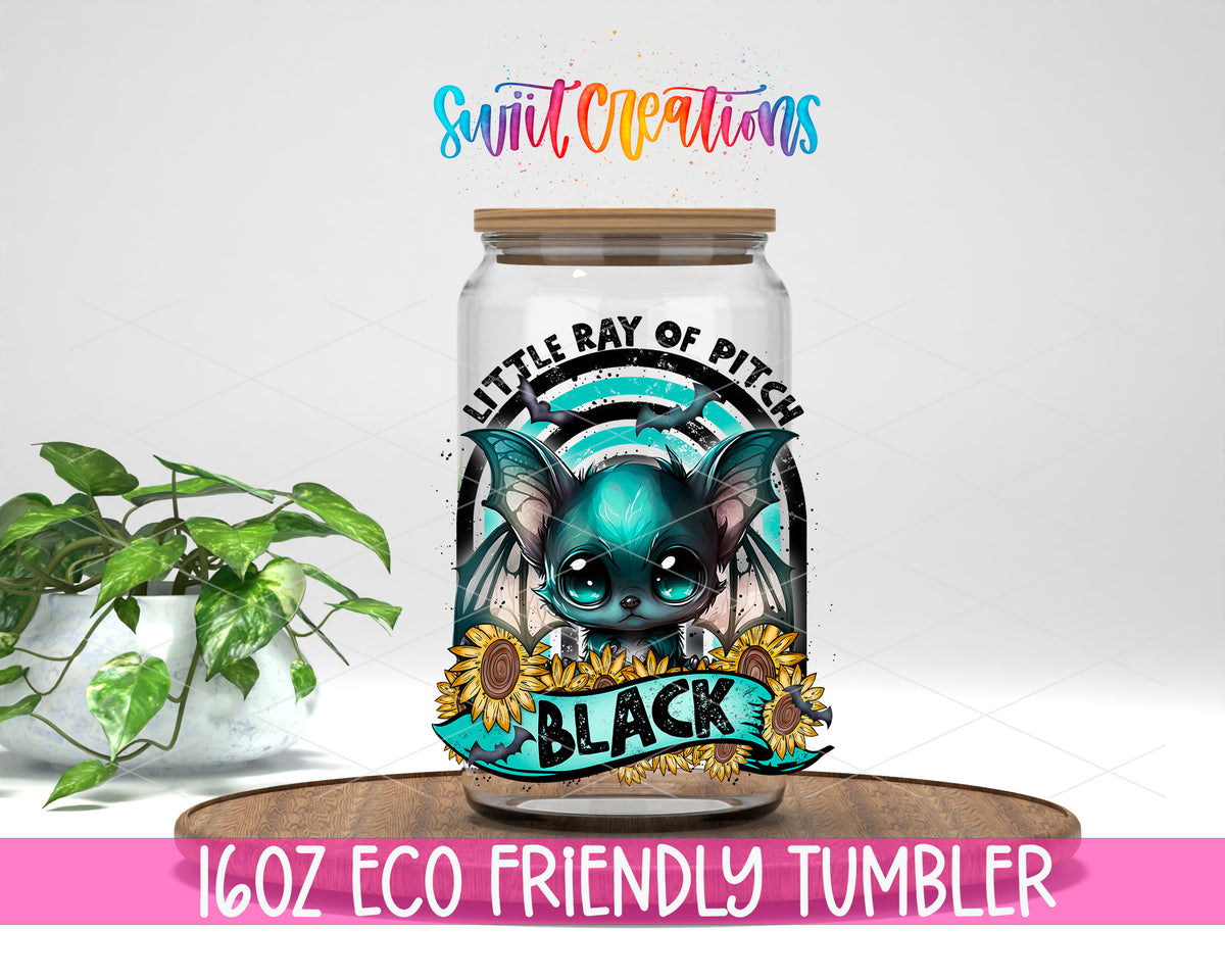 Little Ray of Pitch Black design on a 16 oz clear glass tumbler with bamboo lid