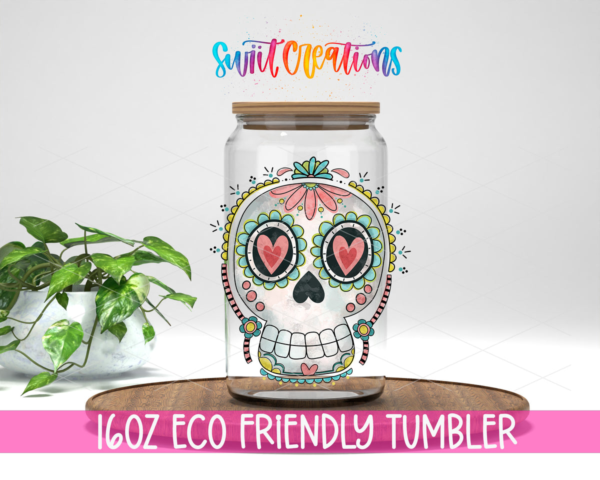 Floral Sugar Skull design on a 16 oz clear glass tumbler with bamboo lid