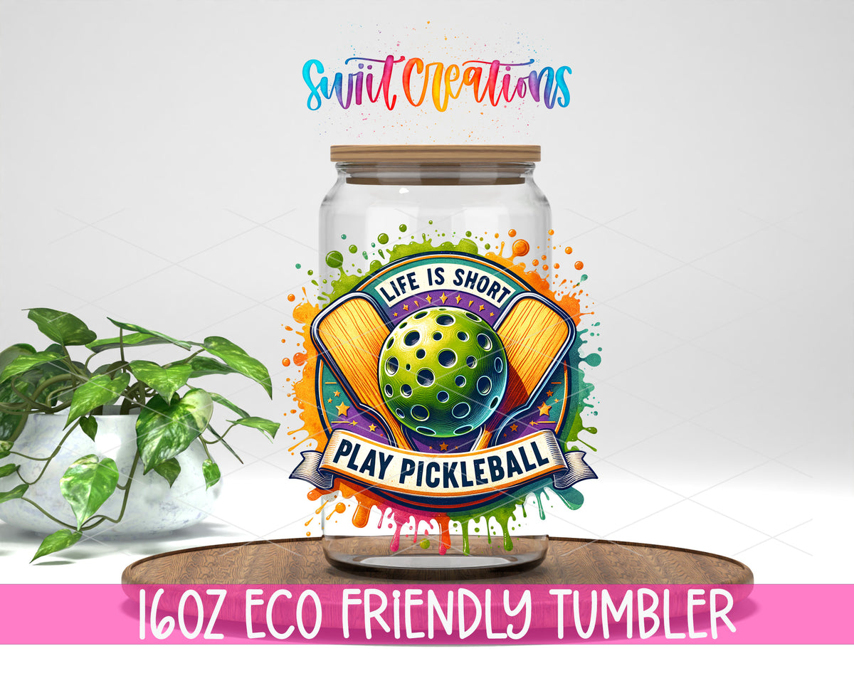 Life Is Short Play Pickleball design on a 16 oz clear glass tumbler with bamboo lid