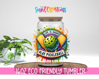 Life Is Short Play Pickleball design on a 16 oz clear glass tumbler with bamboo lid