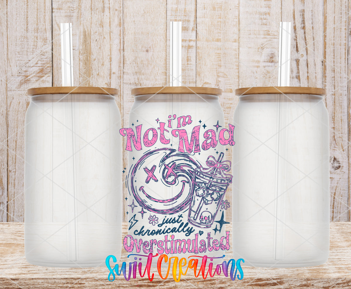 I'm Not Mad Just Overstimulated frosted glass tumbler mockup with bamboo lids and straws