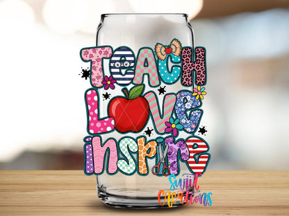 Teach Love Inspire design close-up on a clear glass can tumbler