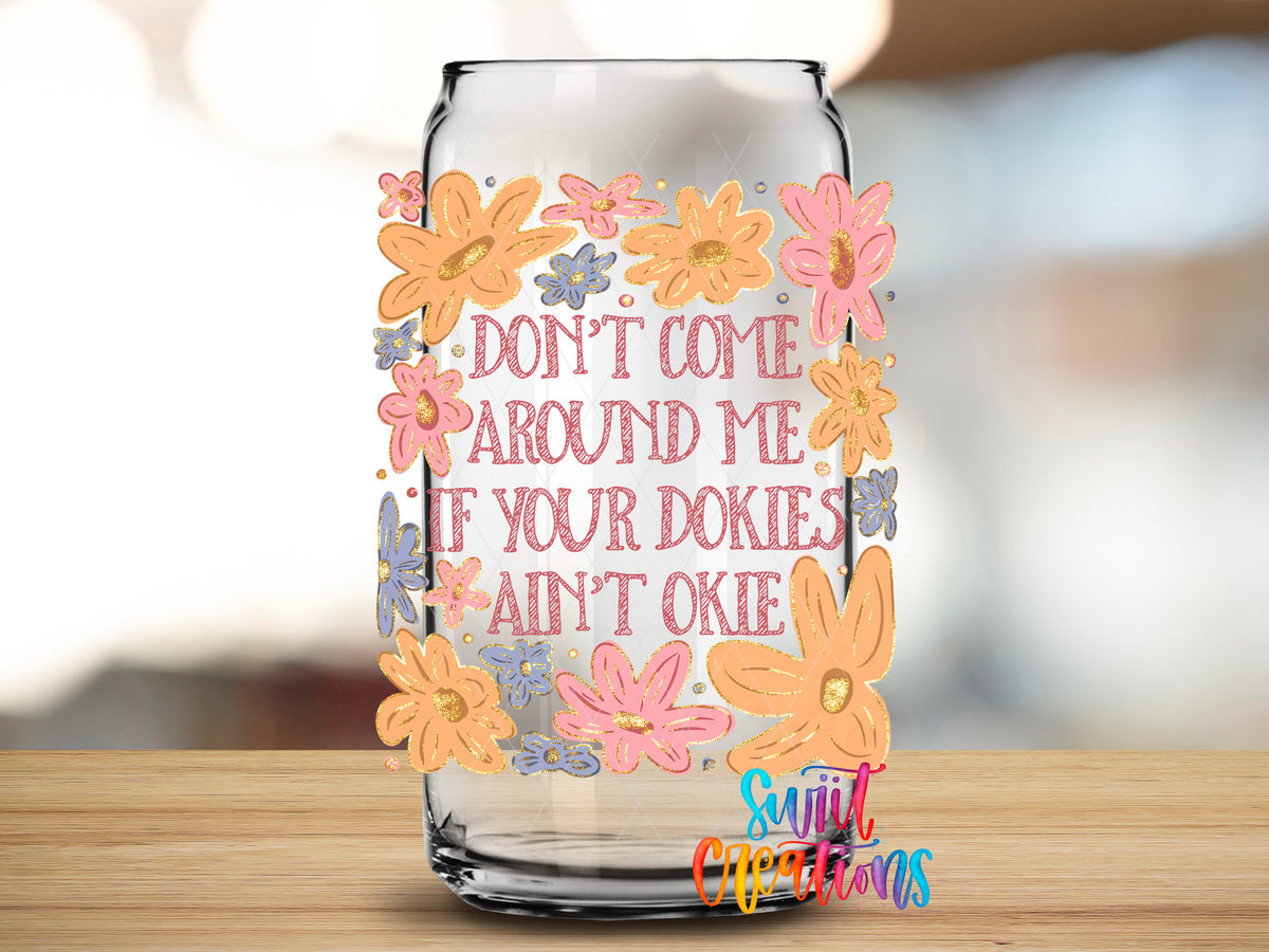 Dookies Ain't Okie design close-up on a clear glass can tumbler