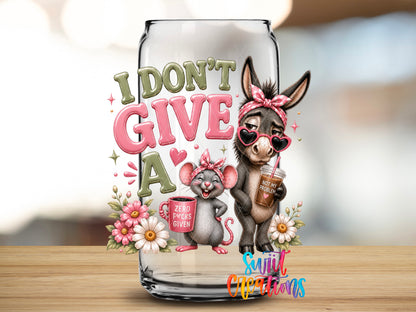 I Don't Give a Rat's Ass design close-up on a clear glass can tumbler