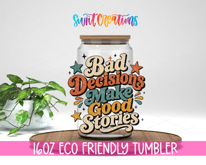 Bad Decisions Make Good Stories design on a 16 oz clear glass tumbler with bamboo lid